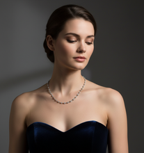 Load image into Gallery viewer, Woman wearing a necklace with a dark background