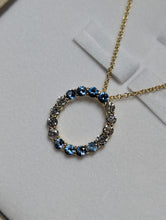 Load image into Gallery viewer, Blue Topaz and Diamond Circle Pendant