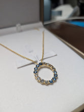 Load image into Gallery viewer, Blue Topaz and Diamond Circle Pendant