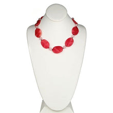Load image into Gallery viewer, An oval-shaped necklace with a series of rose quartz gemstones and a sterling silver filigree clasp, displayed on a mannequin bust.
