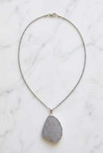 Load image into Gallery viewer, Druzy necklace on white marble with a gently repositioned chain