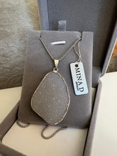 Load image into Gallery viewer, Silver druzy pendant on a sterling silver rope chain displayed in a gray jewelry box