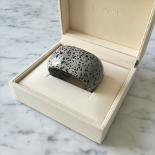 Load image into Gallery viewer, Grey Dalmatian jasper cuff bracelet in jewelry box