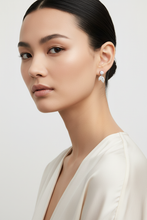 Load image into Gallery viewer, Model wearing diamond drop earrings