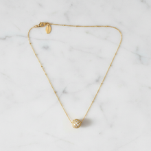 Load image into Gallery viewer, Pavé ball pendant necklace flat lay on white marble