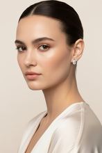 Load image into Gallery viewer, Model wearing pear and marquise diamond stud earrings