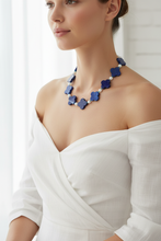 Load image into Gallery viewer, Lapis Lazuli Clover Necklace White Dress Model
