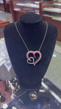 Load and play video in Gallery viewer, Double Heart Ruby Pendant