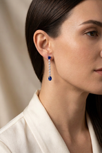 Load image into Gallery viewer, Retouched blue sapphire earring model image