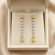 Load image into Gallery viewer, Yellow sapphire earrings in an ivory jewelry box