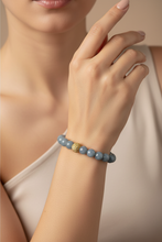Load image into Gallery viewer, Angelite Starburst Bracelet Model
