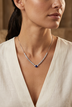Load image into Gallery viewer, Blue sapphire necklace on a model
