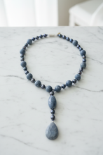 Load image into Gallery viewer, Blue Sponge Coral Necklace on Marble
