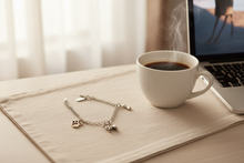 Load image into Gallery viewer, Chihuahua Bracelet - Lifestyle Flat Lay with Coffee and Laptop
