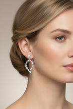 Load image into Gallery viewer, Diamond Pear Shape Dangling Earrings on blonde model
