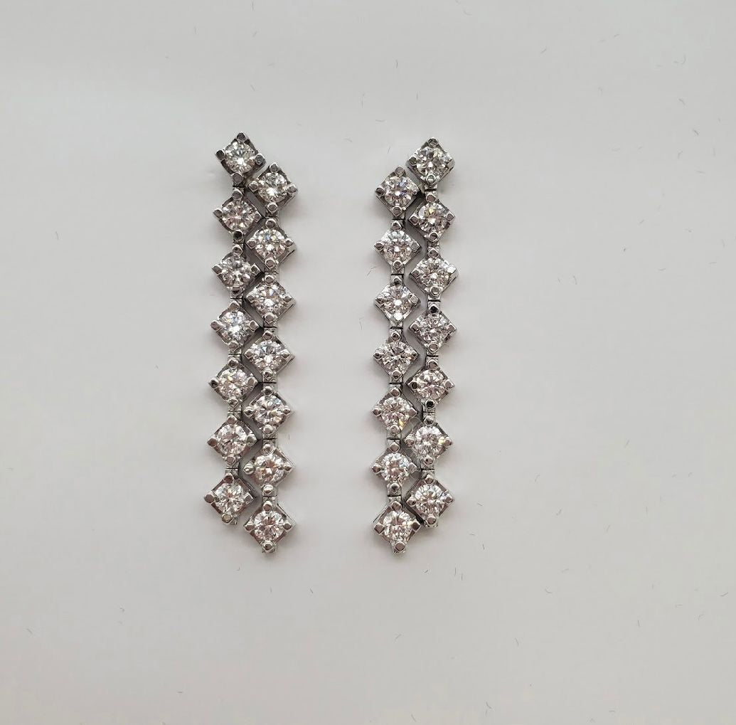 diamond earrings cardinal setting