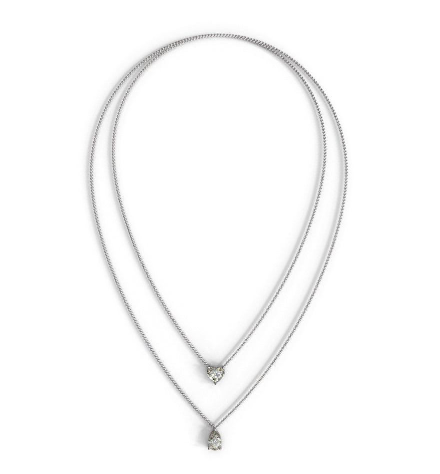 double row diamond pendant necklace with pear shape and heart shape diamond center 