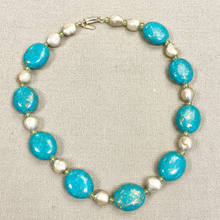 Load image into Gallery viewer, Flat lay turquoise baroque pearl linen background
