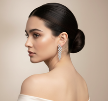 Load image into Gallery viewer, Flowing Pear Shapes Diamond Earrings - Over Shoulder
