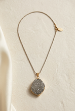 Load image into Gallery viewer, Full necklace editorial with chain and clasp visible
