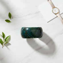 Load image into Gallery viewer, Deep green aventurine cuff bracelet flat lay on marble
