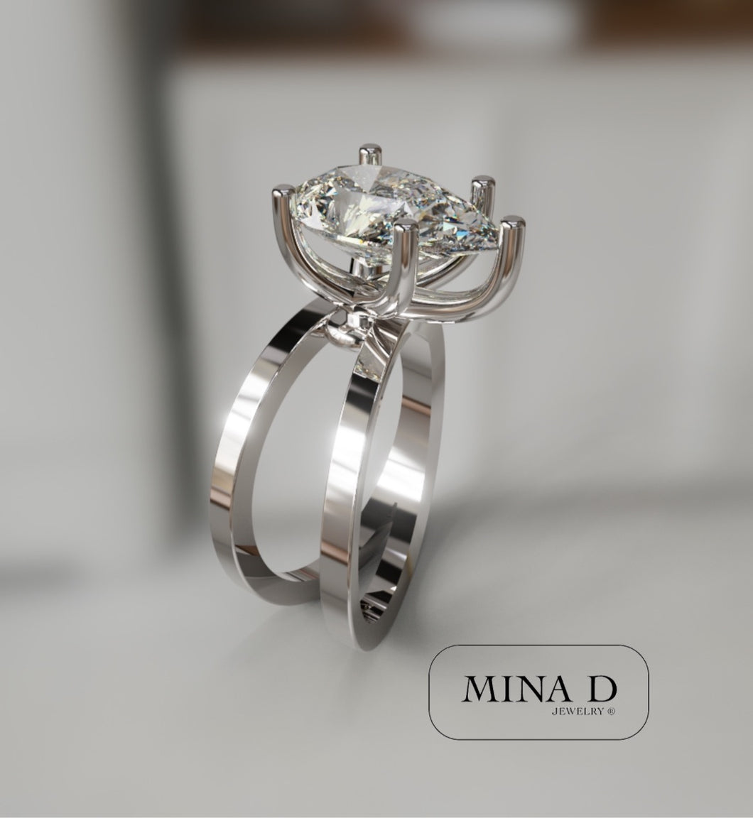 mina d fine jewelry pear shape diamond 2 carat center diamond engagement ring
