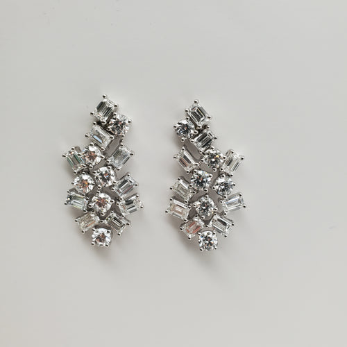 mina d fine jewelry round diamond and emerald diamond  cluster earrings