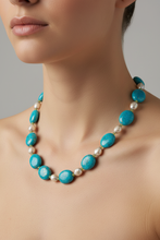 Load image into Gallery viewer, Model shot turquoise baroque pearl corrected pattern
