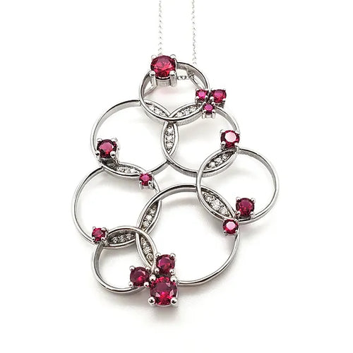 ruby and diamond circular cluster pendan