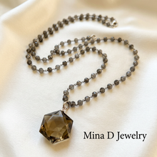 Load image into Gallery viewer, Smoky quartz and labradorite necklace on ivory satin
